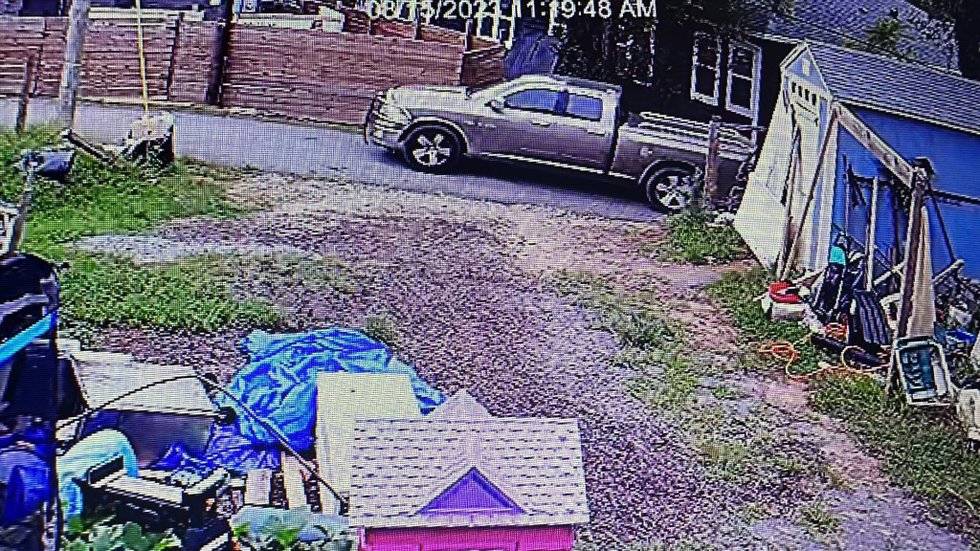 The homeowner says this silver and chrome Dodge Ram was spotted in front of his home as his...