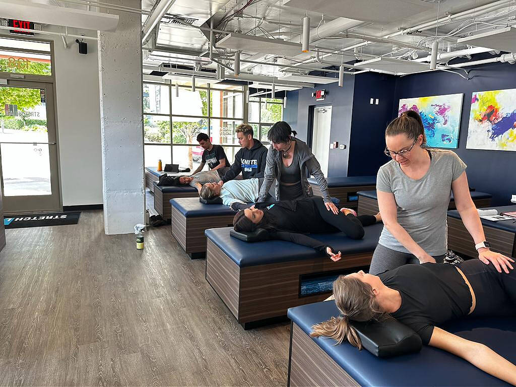 Flexologists guide clients through their stretching sessions. Photo courtesy of Mercer Island StretchLab
