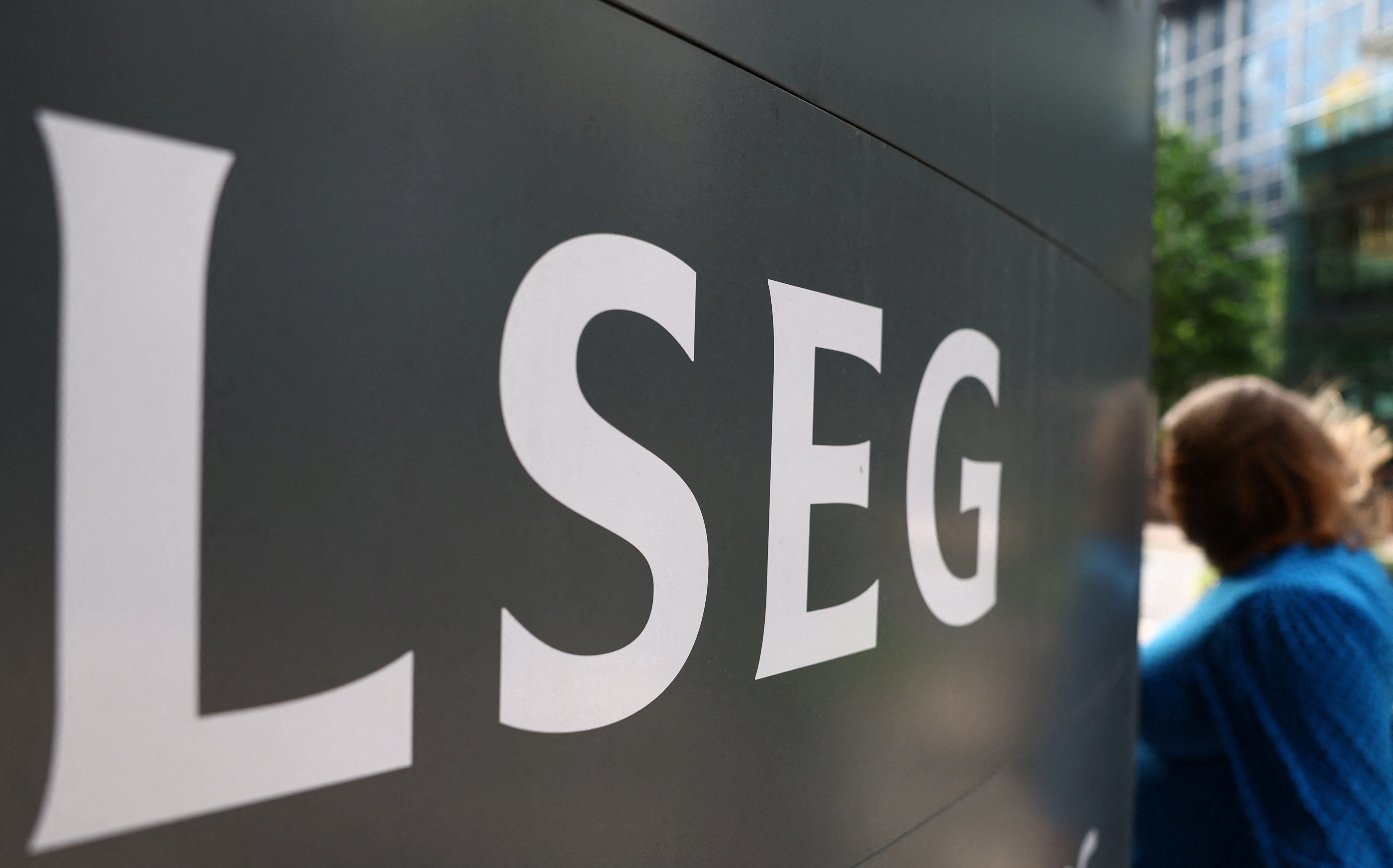 Signage for the London Stock Exchange Group is seen outside of offices in Canary Wharf in London