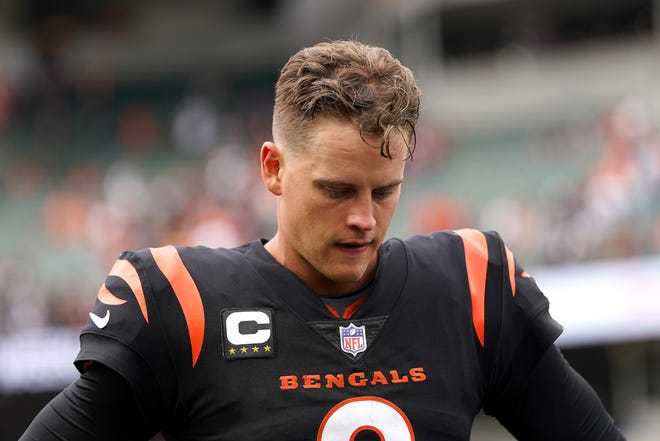 Joe Burrow #9 of the Cincinnati Bengals walks off the field after a loss to the Baltimore Ravens at Paycor Stadium on September 17, 2023 in Cincinnati, Ohio.