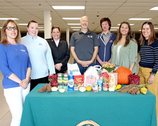 From left to right are Jolene Whitehead, MVSB Branch & Business Development Manager, Melissa Clark, MVSB Branch Services Supervisor, Jamie Blanchette, Salvation Army of Rochester, Donald "Skip" Smith, SHARE Fund, Silas Garcia, Community Action Partnership of Strafford County, Sara Smith, Grace Community Church, and Allison Bussiere, Seacoast Food Provides Network.