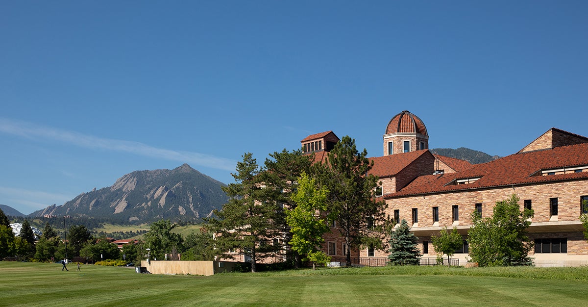 Koelbel Building with the Flatirons in the background