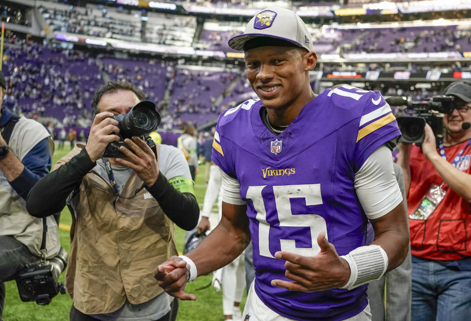 MINNEAPOLIS, MN - NOVEMBER 12: Minnesota Vikings quarterback Joshua Dobbs (15) is all smiles as he leaves the field after an NFL game between the Minnesota Vikings and New Orleans Saints on November 12, 2023, at U.S. Bank Stadium in Minneapolis, MN. (Photo by Nick Wosika/Icon Sportswire via Getty Images)