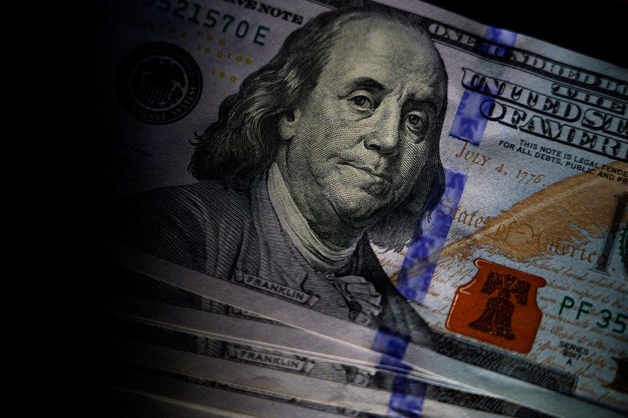 FILE - likeness of Benjamin Franklin is seen on U.S. $100 bills, Thursday, July 14, 2022, in Marple Township, Pa. Payroll payments per small business moderated as 2023 came to a close, according to new data from Bank of America. The BofA report found payroll payments rose 1.7% in December at small businesses. (AP Photo/Matt Slocum, File)