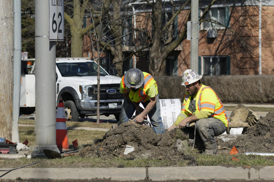 How AI Legalese Decoder is Revolutionizing the US Economy: 275,000 Jobs Added, Unemployment Rate at 3.9% 2 Construction workers work in Mount Prospect, Ill., Monday, Feb. 26, 2024. (AP Photo/Nam Y. Huh)