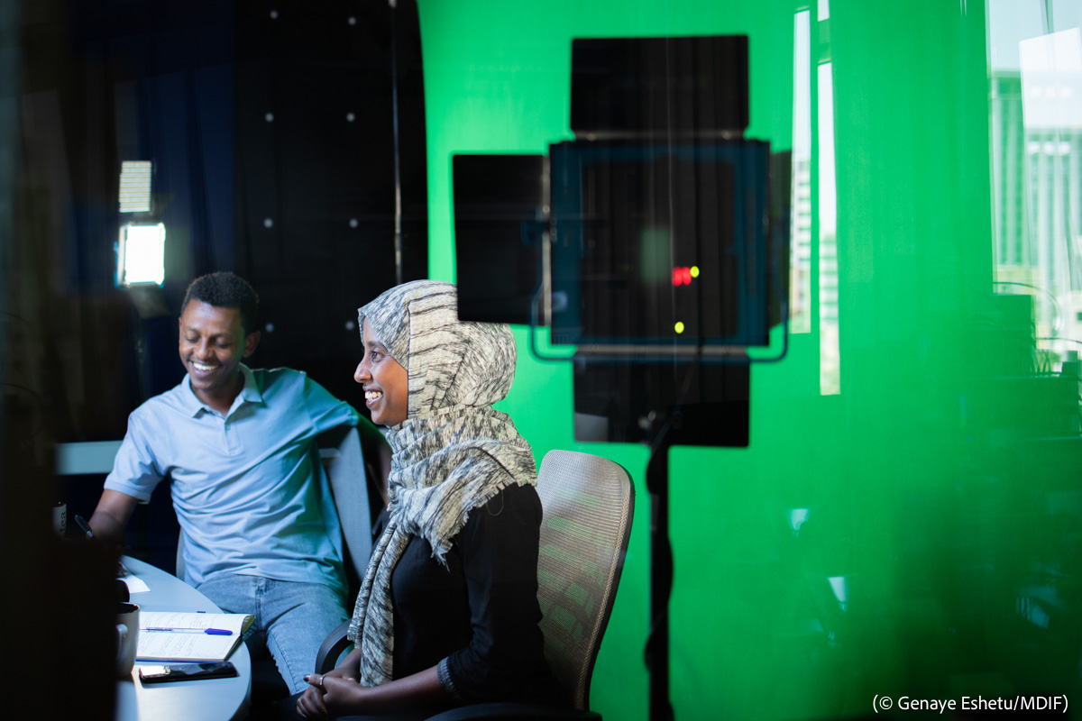 Journalists in television studio preparing for broadcast (© Genaye Eshetu/MDIF)