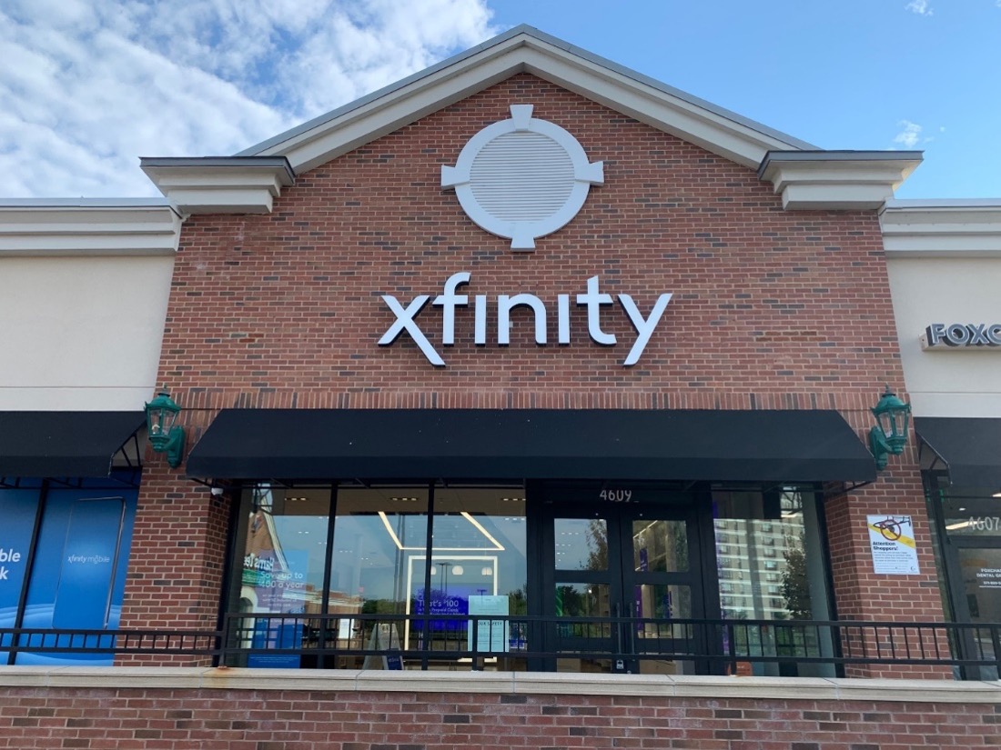 Exterior photo of Xfinity store in Alexandria--brck structure in shopping center with logo