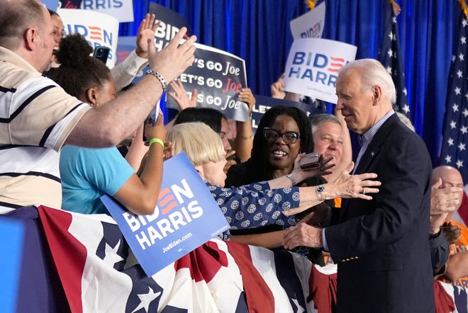 President Joe Biden, right, greets supporters at a campaign rally at Sherman Middle School in Madison, Wis., Friday, July 5, 2024.