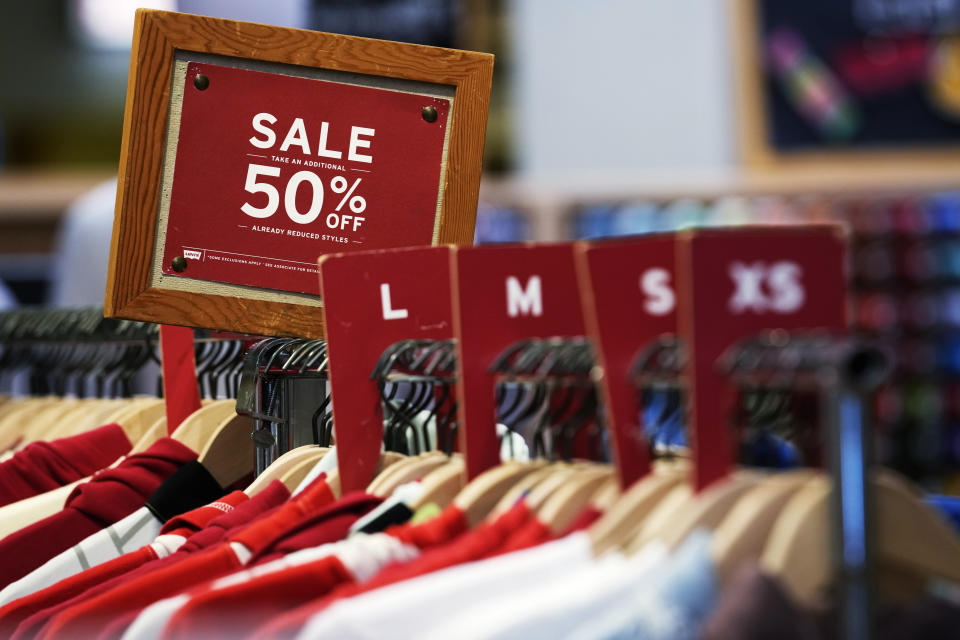 A sale sign is displayed on a rack of clothes at a store in Chicago, Monday, June 10, 2024. On Thursday, July 11, 2024, the Labor Department issues its report on inflation at the consumer level in June. (AP Photo/Nam Y. Huh)