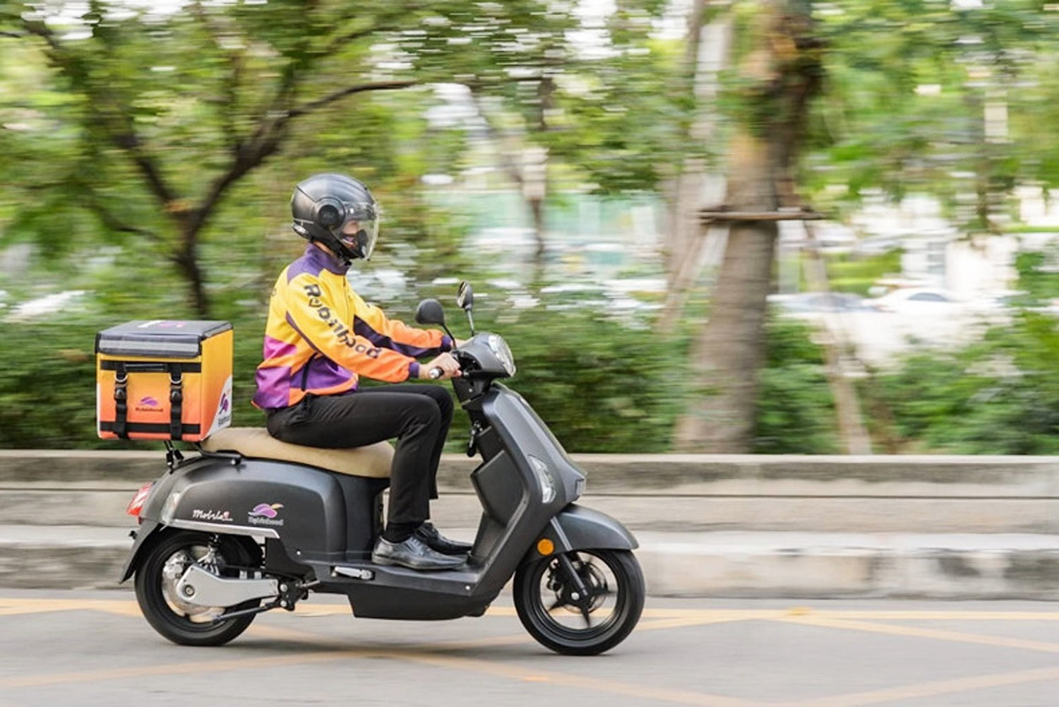 A Robinhood delivery driver in Bangkok