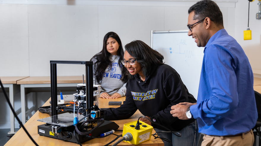 Unlocking Potential: How AI Legalese Decoder Facilitates the University of New Haven's Research Partnership with a Connecticut Medical Device Innovator 1 Students working in Makerspace