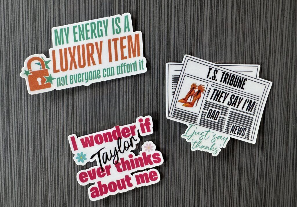 Lee has recently started making stickers that go along with her shirt designs.